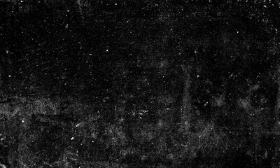 Obraz premium Distressed black texture featuring worn grainy overlay effects with scattered white particles and subtle vintage scratches on a dark surface