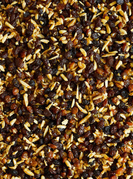 Close-up background of raisins and almond slivers mixture