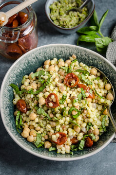 fregola salad with green olive relish and chickpeas