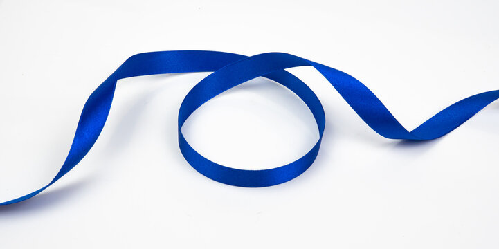 Abstract shape blue ribbon isolated on white background.
top view