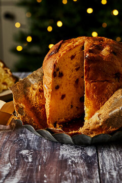 Panettone on silver table on table sliced