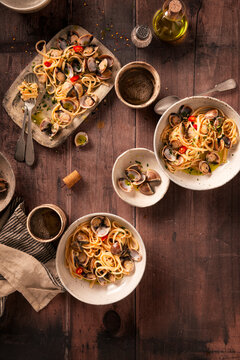 spaghetti vongole, pasta with clams in plates