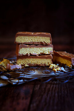 Popular viral trend, pistachio-filled Dubai chocolate bars. Dubai chocolate is a milk chocolate bar filled with a sweet pistachio-tahini cream and kadayif chopped filo pastry.