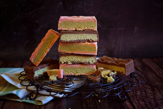 Popular viral trend, pistachio-filled Dubai chocolate bars. Dubai chocolate is a milk chocolate bar filled with a sweet pistachio-tahini cream and kadayif chopped filo pastry.