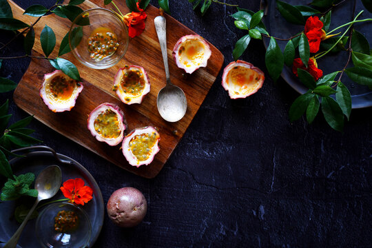Australian Black Passionfruit (Passiflora Edulis) is a popular fruit known for its sweet, aromatic pulp and unique, vibrant flavour. The versatile pulp adds a tropical touch to various dishes