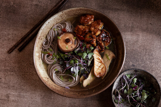 Vegan miso noodles with mushrooms, tempeh, and fresh microgreens