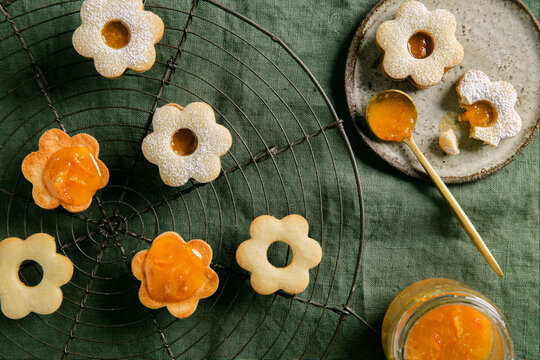 Flower-Shaped Jam Cookies on Cooling Rack