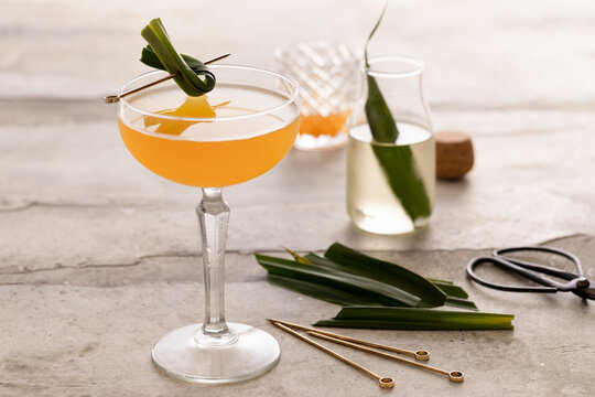 Calamansi lime gimlet with pandan simple syrup and fresh garnish