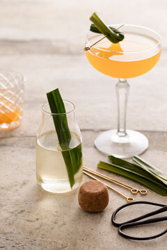 Pandan simple syrup with calamansi cocktail in the background