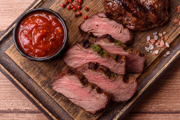 Beef mignon steak, rare, meat grilled with salt and spices. Beef steak