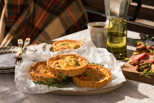 Mini quiches served for a cozy outdoor brunch picnic