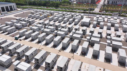 Large outdoor array of white energy storage container units for industrial power grid