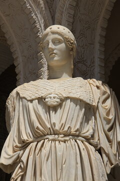 A detail of a Roman statue in the Casa de Pilatos (Pilate&rsquo;s House), an Andalusian palace in Seville, Spain