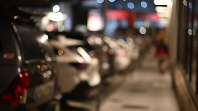 Blurred Cars in a Row, Indoor Parking Garage, Soft Lighting