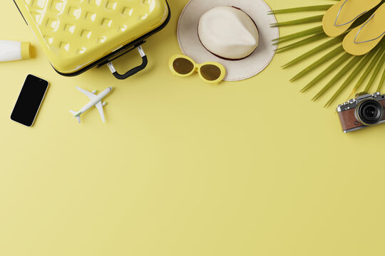 Summer travel accessories flat lay on yellow background