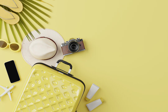 Summer travel accessories flat lay on yellow background