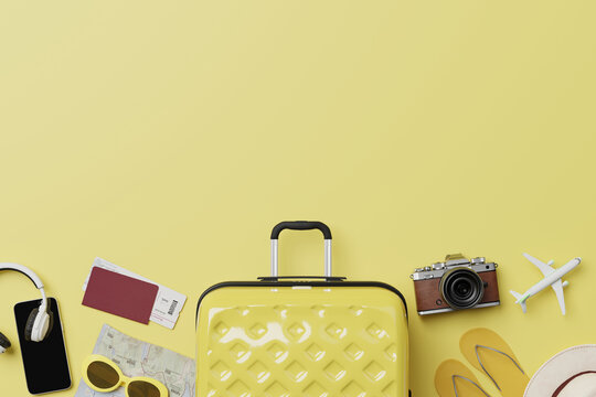 Summer travel accessories flat lay on yellow background