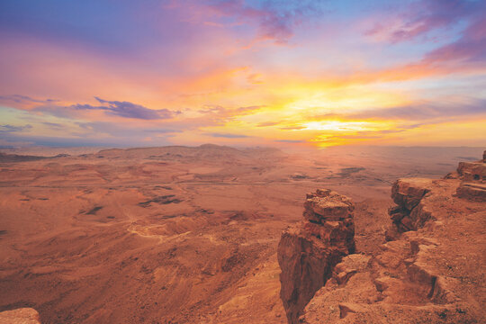 Beautiful dramatic sunset over the desert. Nature landscape. Makhtesh Ramon Crater, Israel