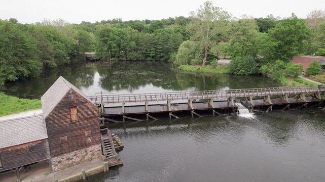 Aerial View of Historic Philipsburg Manor Grist Mill and Dam on Calm Pond