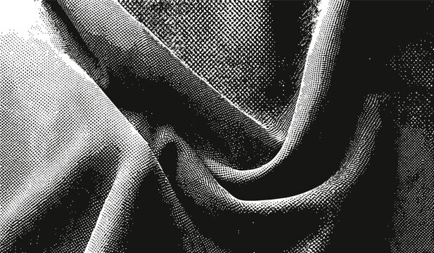 Close up abstract fabric texture with deep folds and dramatic shadows in black and white photography