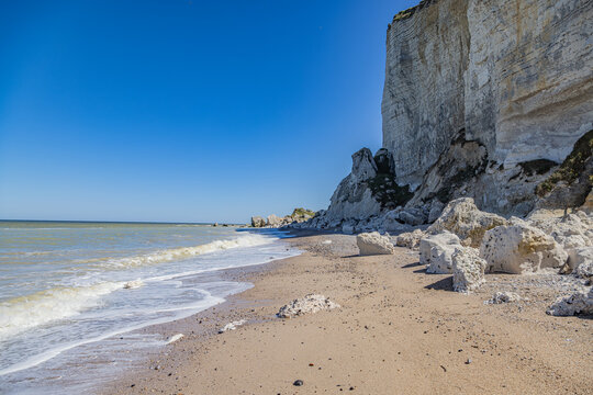 Towering White Chalk Cliffs and Rugged Pebble Beach on the Alabaster Coast in Normandy