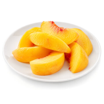 Peeled nectarine slices on a glossy white plate