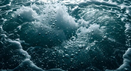 Fototapeta premium Bubbles rising in clean ocean water creating abstract pattern and deep sea texture
