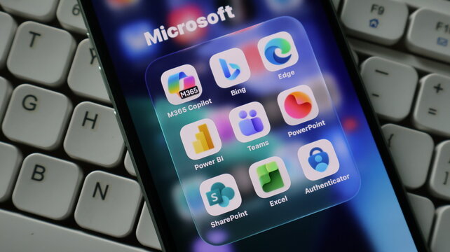 microsoft  applications, an iPhone,  screen, display, a logo, technology software, digital interface icons, m365, copilot, bing, edge, teams, powerpoint, power, bi, authenticat in a back keyboard