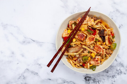fried noodles with chicken meat and vegetables, Bami Goreng, Indonesian dish, no people,