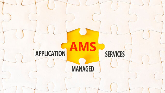 AMS application managed services symbol. Concept words AMS application managed services on beautiful white puzzles. Beautiful yellow background. Business AMS concept. Copy space.