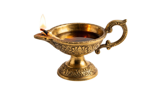 Traditional brass oil lamp diya with burning wick isolated on transparent background