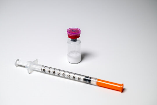 Peptides and syringe. Peptides are amino acids that are used in a myriad of medical ways from glucose control to battling inflammation.