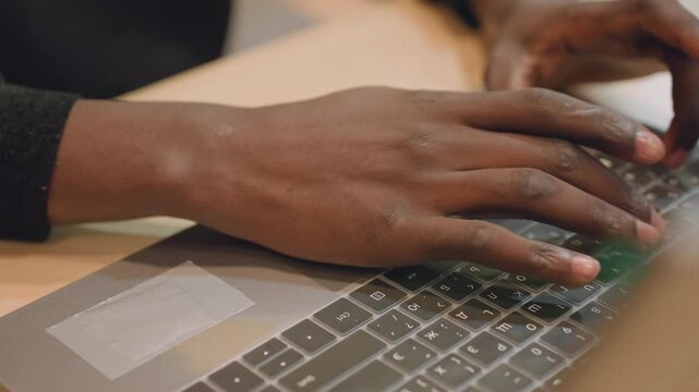 Developer revises complex software code. Individual intensely concentrates while debugging computer programs. Silently engaged developer finetunes intricate software scripts under soft desk lighting