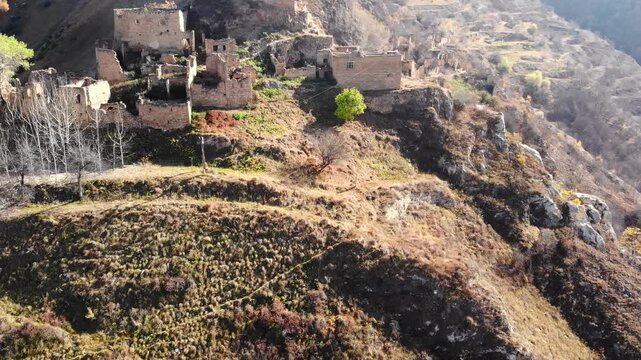 Sunlit Terraced Village Amid Colorful Foliage. Panoramic Shot Of Hillside Homes And Winding Trail . Media