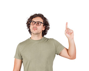 Naklejka premium Casual male pointing up index finger while looking aside, isolated on transparent background with copy space. Guy wearing eyeglasses, shows upwards as warning to pay attention