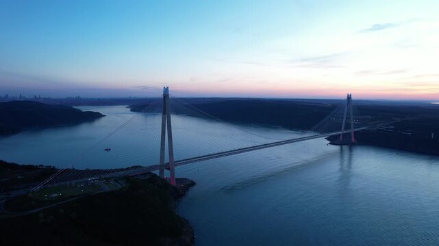 Yavuz Sultan Selim Bridge in Istanbul, Turkey. Aerial view at sunset with drone. Colorful bridge and weather.
