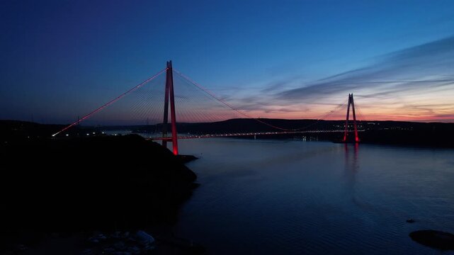 Yavuz Sultan Selim Bridge in Istanbul, Turkey. Aerial view at sunset with drone. Colorful bridge and weather.