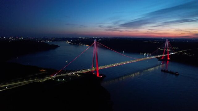 Yavuz Sultan Selim Bridge in Istanbul, Turkey. Aerial view at sunset with drone. Colorful bridge and weather.