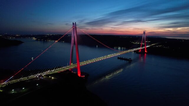 Yavuz Sultan Selim Bridge in Istanbul, Turkey. Aerial view at sunset with drone. Colorful bridge and weather.