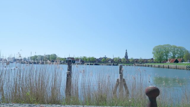 Scenic view of the dutch village hindeloopen across the water