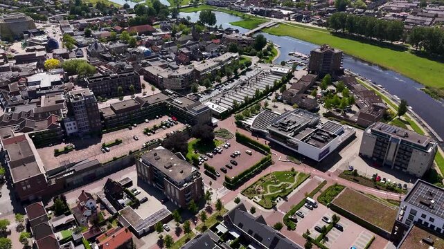 Aerial view of a dutch town with contemporary architecture and river