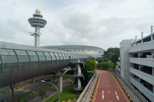 Changi Airport control tower and Jewel glass dome with pedestrian link bridge