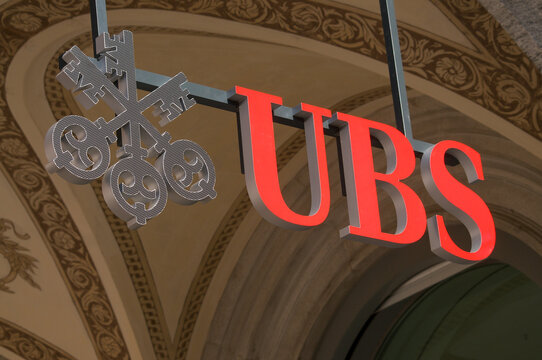 UBS bank corporate sign and logo hanging outside a branch office in Lugano Switzerland