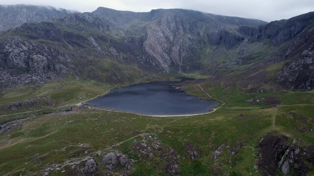 Glacial Mountain Lake Beneath Steep Cliffs, Snowdonia