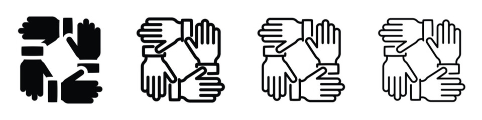 Obraz premium Four hands clasped together in a circle symbolizing unity and teamwork
