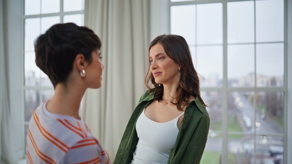 Naklejka premium Romantic girlfriends dancing slowly enjoying relaxed domestic leisure closeup.