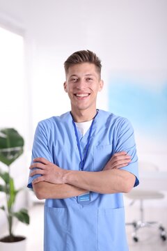Portrait of medical assistant in scrubs at clinic
