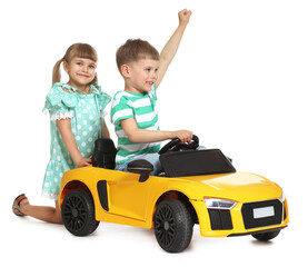 Fototapeta premium Little children with toy car on white background