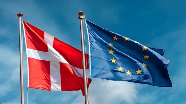 danish flag waving next to eu flag in blue sky. denmark european union member