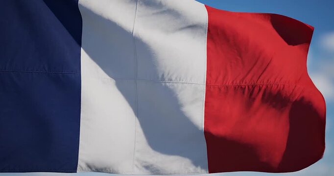 The France Flag Waving Proudly in the Blue Sky